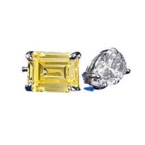 Elegant S925 silver open ring featuring emerald-cut yellow and pear-cut white stones