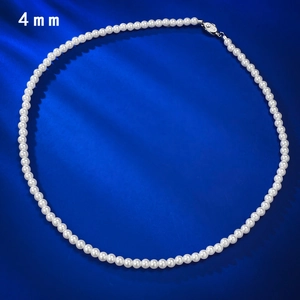 Elegant 4mm white round pearl necklace with S925 sterling silver clasp on navy velvet