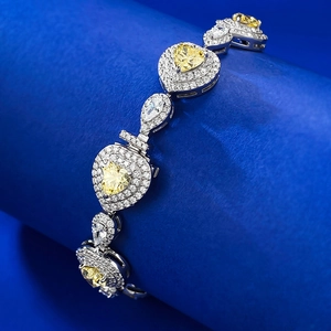 Luxurious S925 silver bracelet featuring heart-shaped yellow diamonds and white gems