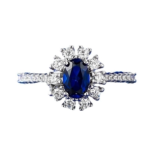 Bague luxueuse en argent S925 avec saphir bleu ovale entouré de petits diamants brillants