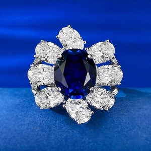 S925 sterling silver flower cocktail ring with oval blue sapphire and clear crystals