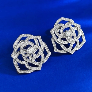 Sparkling camellia flower earrings in S925 silver with full micro-pave diamond petals