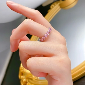 Elegant S925 silver ring featuring five pink heart-shaped crystals in a row design