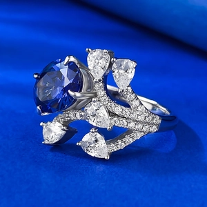 S925 sterling silver ring featuring a 7x9mm oval blue gemstone in a twig design