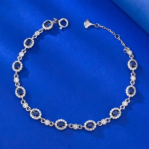 Elegant S925 sterling silver adjustable bracelet with oval blue sapphire halo stones