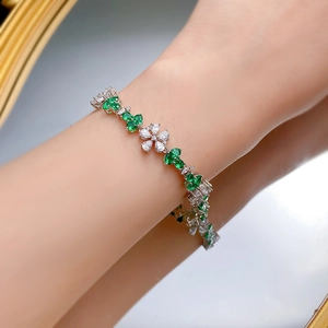 Elegant S925 silver bracelet with green pear-shaped gemstone clover and white crystals