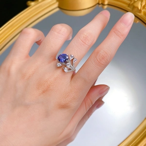 Elegant S925 silver ring with oval blue tanzanite gemstone on model hand