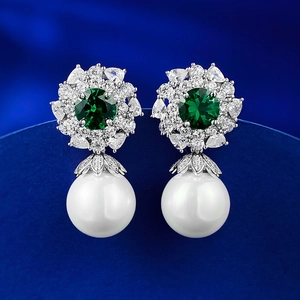 Elegant 925 silver flower stud earrings with green gemstones and 12mm round white pearls