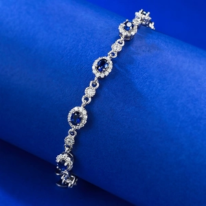 S925 sterling silver bracelet with oval blue sapphires and sparkling accent stones