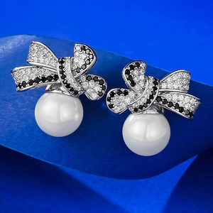 Elegant 925 silver 10mm pearl stud earrings with black and white zircon bow design