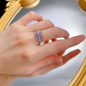 Detail of S925 silver ring featuring a 5x5mm square purple stone and pavé leaf design