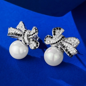 Elegant 925 silver bowknot earrings with bicolor zircons and 10mm white pearls