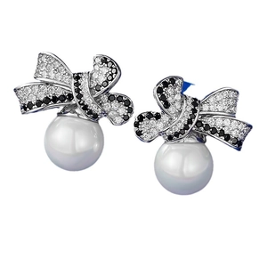 Elegant 925 silver bow-knot pearl earrings featuring black and white zircon stone setting