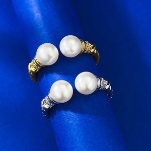 Close-up of S925 silver bypass open rings with 6mm pearls and sparkling pavé accents