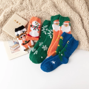 Thick coral fleece Christmas socks with festive snowman and Santa patterns for winter