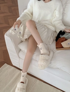 Detailed embroidery and 3D bear ears on soft coral fleece socks in multiple colors
