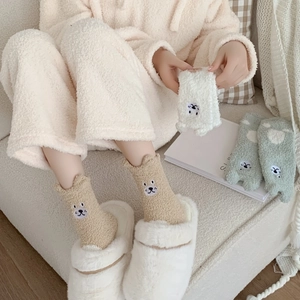 Thick coral fleece socks featuring 3D ears and cartoon animal embroidery in warm tones