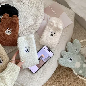 Detail showing soft coral fleece bear socks with 3D ears and cute cartoon embroidery
