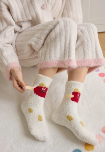 Detailed view of thick coral fleece socks with cute cartoon embroidery for home