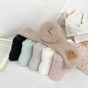 Set of six colorful fluffy coral fleece socks with cute cartoon bear embroidery