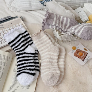 Striped coral fleece socks for women with ruffled cuffs in black, beige and purple