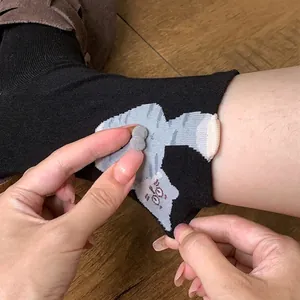 Funny black cotton crew socks with 3D plush ball cartoon cat design for women