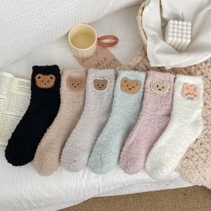 Six pairs of colorful coral fleece socks with cute cartoon animal patches for winter