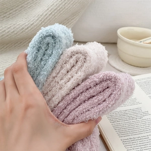 Soft coral fleece dachshund socks in light blue and pink for cozy winter home wear