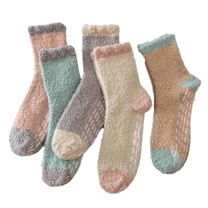 Thick coral fleece thermal socks with anti-slip silicone grippers in five soft pastel colors