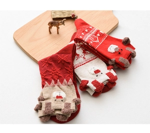 Close-up of Christmas crew socks with 3D reindeer motif and soft knit texture details