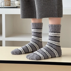 Women's cozy coral fleece striped socks in grey and white for home and winter warmth