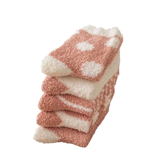 Thick coral fleece thermal socks set featuring pink and white polka dot pattern for winter