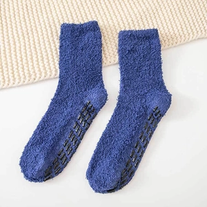 Navy blue coral fleece thermal socks with non-slip silicone grippers on the sole
