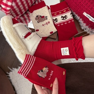 Detailed embroidery of lucky horse motif and festive slogans on red combed cotton socks