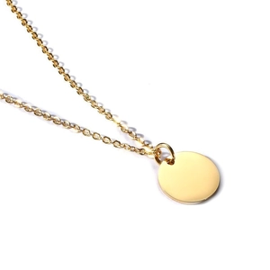 Polished gold stainless steel coin pendant with minimalist O-chain necklace on white background