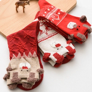 Christmas themed mid-calf socks with reindeer patterns and 3D plush deer ears decorations