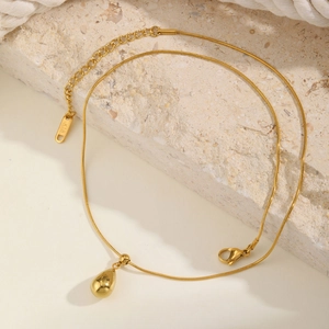Detail of gold water drop necklace with K18 snake chain and adjustable lobster clasp