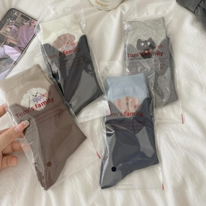 Four pairs of cute animal-themed cotton crew socks with 3D cat and dog patches in various colors