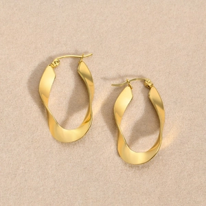 Polished golden stainless steel Mobius twist hoop earrings with a sleek mirror finish