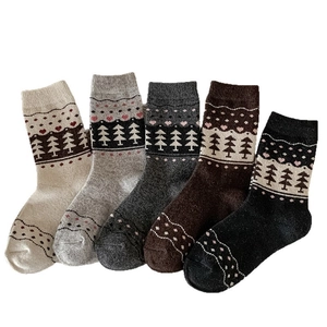 Five-pack of Nordic vintage wool socks in various colors with classic knit patterns