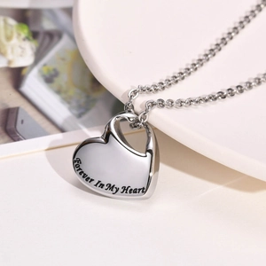 Polished heart-shaped memorial necklace with Forever In My Heart engraving in silver steel