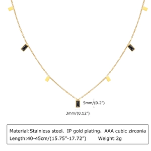 Macro detail of gold-plated rectangle necklace with black cubic zirconia measurements