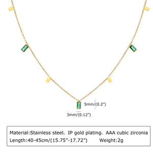 Gold stainless steel rectangle necklace with green cubic zirconia and gold pendants