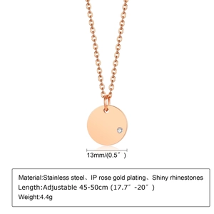 Detail of 13mm gold stainless steel round pendant necklace with shiny rhinestones