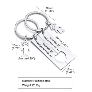 Detailed view of couple keychain set with heart cutout and Drive Safe engraving dimensions