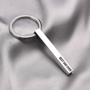 Polished stainless steel bar keychain engraved with Best Dad Ever on silk background