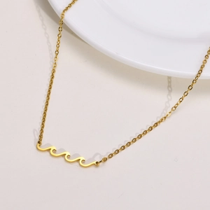 Minimalist gold wavy pendant necklace for women in polished stainless steel on white background