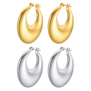 Boucles d'oreilles goutte évidées en finition or 18 carats et argent poli