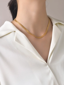 Elegant 18k gold plated double row wheat chain necklace styled on model with white shirt