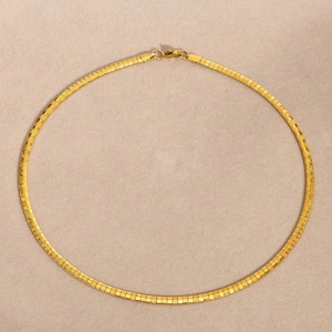Elegant gold-tone hammered flat snake chain necklace made of stainless steel for women